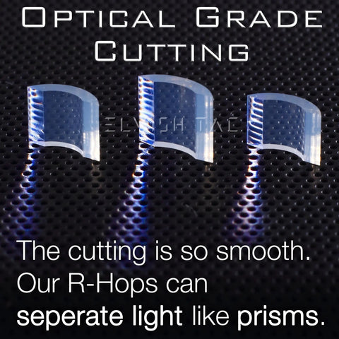 Optical grade cutting of R Hop AEG Upgrade Kit parts on textured surface, showcasing their ability to separate light like prisms.
