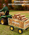 Heavy Duty 4 In 1 Steel Garden Cart Workhorse with 1500 lb capacity attached to ATV hauling firewood, dark green frame, yellow hubs.