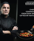 Chef displaying Preseasoned 14 Inch Carbon Steel Wok With Round Bottom for Stir Fry Mastery on Gas Stovetops Open Flame and BBQ