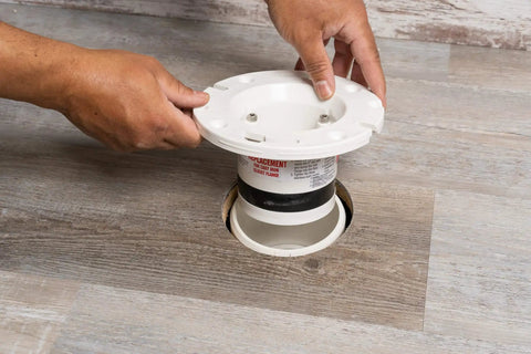 Installing Four Inch Closet Flange Replacement For Toilets With Adjustable Compression Joint, durable rubber gasket visible