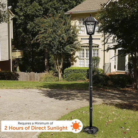Solar Lamp Post Kit 77 Inch Outdoor Light With Black Resin Post Clear Lens in a yard setting