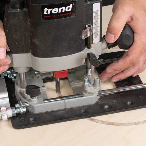 Multifunction Combination Router Base With Quick Change Design And Offset Baseplate for precision cutting in wood.