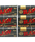 Six packs of Classic Black One And A Quarter Size Natural Unrefined Ultra Thin 79mm Rolling Papers displayed in a stack.