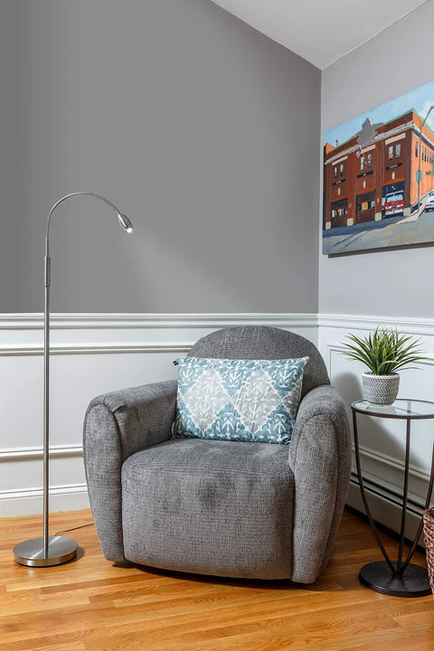 Focus Adjustable Beam Led Floor Lamp With 15.5 Inch Gooseneck And Pull Shade in a cozy reading nook with a grey chair