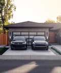 Tesla Universal Wall Connector For Home EV Charging Dual Plug NACS And J1772 Level 2 EV Charger installed in garage
