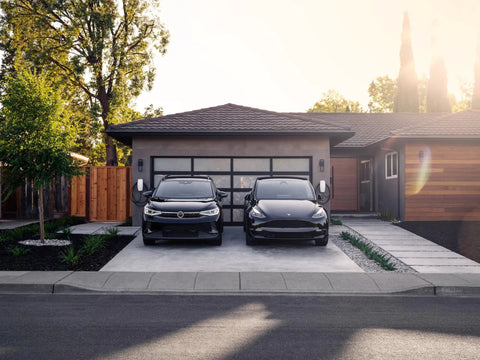 Tesla Universal Wall Connector For Home EV Charging Dual Plug NACS And J1772 Level 2 EV Charger installed in garage