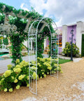 White Wedding Garden Arch Arbor With Curved Metal Archway For Climbing Plants Roses And Vines Backyard Patio Lawn Outdoor Ceremony Ready To Stand Up To Wind Heavy Duty Iron Frame With Powder Coating Anti Rust And Easy Setup