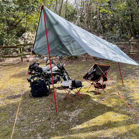 Rugged All Weather Waterproof Tent Tarp Hexagon Rain Fly With Hammock Ground Cloth And Sunshade Mat for camping setup in forest.