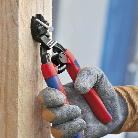 Angled CoBolt Cutters 8 Inch, 20 Degree Head, Locking Spring, cutting a nail against wood
