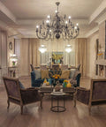 Elegant living room with chandelier using LED Light Bulb 4.5W 120V E12 Candelabra Base 3000K Soft White 290 Degree Beam Clear Glass.