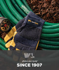 Heavy Duty Leather Palm Work Gloves For Men With HydraHyde Water Resistant Leather And Flexible Spandex Back All Day Comfort Adjustable Closure Ideal For Construction Landscaping And Diy Projects Blue Large resting on green garden hose.