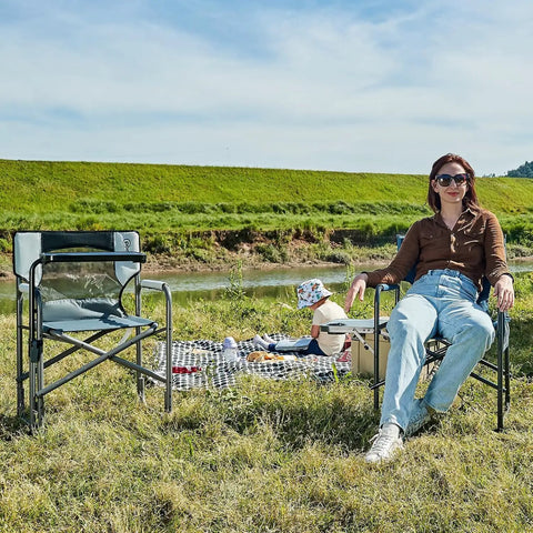 Outdoor scene with Heavy Duty 300 Lb Folding Director Chair With 2 Way Rotating Side Table, showing ergonomic mesh back near picnic setup