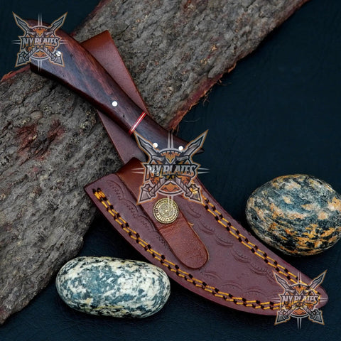 Beast Damascus Steel Skinner Knife with wood handle on leather sheath, ideal for hunting and camping.