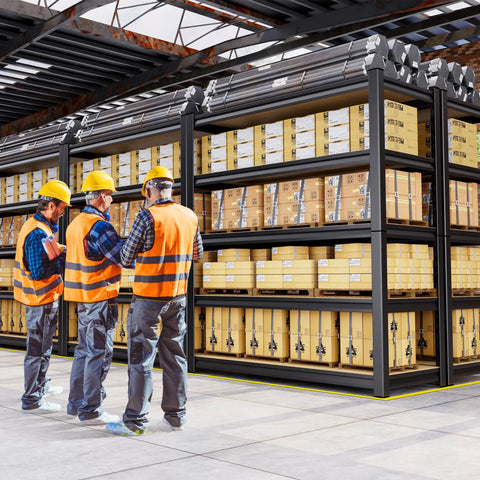Workers examining sturdy 71 inch heavy duty garage shelving unit with 2050 lb capacity in industrial warehouse setting.
