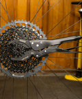 Vise Whip II Cassette Removal Tool For Bikes, No Slip Locking Design Keeps Cogs Steady While You Crank 9 To 23 Tooth Gears, Heat Treated Steel Tough in action.