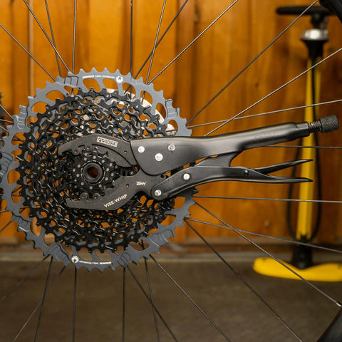 Vise Whip II Cassette Removal Tool For Bikes, No Slip Locking Design Keeps Cogs Steady While You Crank 9 To 23 Tooth Gears, Heat Treated Steel Tough in action.