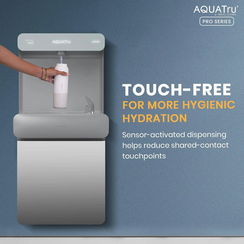 Person using Wall Mounted Water Dispenser With Touch Free Sensor High Capacity 9.5 GPH Cooling Filter Monitor NSF Certified