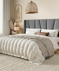Flat Out Comfy Queen Size Upholstered Platform Bed Frame With Wingback Headboard And High Density Foam Padding Wrapped In Soft Breathable Velvet Fabric For Stylish Grey Rooms in a cozy bedroom setting.