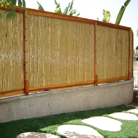 Natural Bamboo Fence Roll Panel 0.75 Inch Thick 6 Foot High By 8 Foot Long for outdoor privacy on a patio wall.