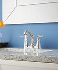 Linden Centerset Chrome Bathroom Faucet With Diamond Seal Technology And Metal Drain installed on granite vanity
