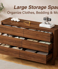 Totally Clutch Modern Dresser For Bedroom Featuring Spacious Walnut Drawers And Sleek Contemporary Design That Honestly Serves As A Big Time Room Upgrade with open drawers and storage.