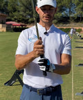 Golfer demonstrating Grip Alignment Training Golf Glove With Non Slip Silicone Palm For A Lockdown Swing, Medium Large Left Hand.