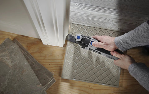 Using 3.5 Amp Oscillating Tool Kit With Tool-Less Accessory Change, 12-Piece Set for grout removal in a home renovation