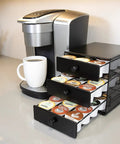 Coffee Pod Drawer For KCups 3 Tier Organizer With 36 Pod Capacity Sleek Black Satin Finish next to coffee machine on counter