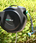 Retractable Garden Hose Reel With 100 Ft 5/8 Inch Hose Wall Mounted 180 Degree Swivel Bracket on a sunny day