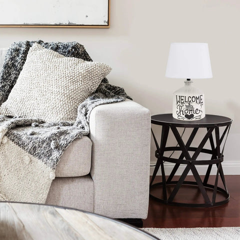 Welcome Home Rustic Ceramic Farmhouse Table Lamp With White Linen Shade, White Wash Ridged Base on living room side table