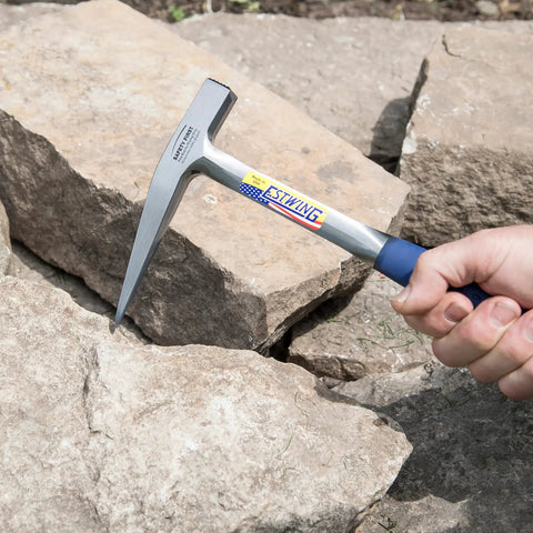 Rock Pick Hammer 13 Oz Field Geology Tool with milled face and shock reduction grip being used on rocks.