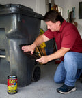 Man applying Built Tough Max Strength Waterproof Tape For Leaks That Seals And Patches On Wet Surfaces Underwater Ready Rubberized Black Tape to trash bin.