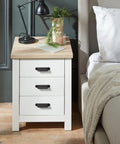 Bedroom nightstand with Six Pack Black Cabinet Cup Pulls And Drawer Handles on white drawers, 5.04 Inch zinc alloy bar pulls