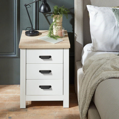 Bedroom nightstand with Six Pack Black Cabinet Cup Pulls And Drawer Handles on white drawers, 5.04 Inch zinc alloy bar pulls