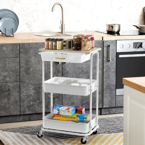 3 Tier Rolling Utility Cart With Drawer And Wood Tabletop Maple Finish in kitchen setup with storage items