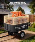 750 Lb Capacity Pull Behind Yard Cart With 17 Cubic Feet Bed Removable Mesh Sides Pneumatic Tires in garden setting.