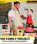 Father and child enjoying a DIY project with Junior Tool Belt Set For Kids Ages 5 And Up With Realistic Play Tools And Tough High Strength Fabric In Mixed Colors For Safe Imaginative DIY Fun That Feels Kid Friendly And Hands On Learning