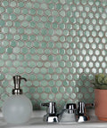 Mint Green Hex Porcelain Mosaic Tile For Floors And Walls, 1 Inch Hex, Mesh Mounted, Glossy Finish With Subtle Tone Variation in a bathroom setting