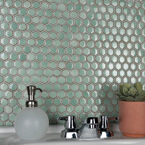 Mint Green Hex Porcelain Mosaic Tile For Floors And Walls, 1 Inch Hex, Mesh Mounted, Glossy Finish With Subtle Tone Variation in a bathroom setting