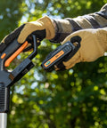 Inserting battery into 20V Cordless Garden Tiller Cultivator With 7.5 Inch Width, 6 Inch Depth, 4 Steel Tines outdoors