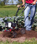 Cultivator With 43Cc 2 Cycle Viper Engine 6 To 10 Inch Adjustable Width 8 Inch Maximum Depth in action tilling garden soil