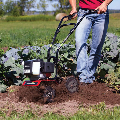 Cultivator With 43Cc 2 Cycle Viper Engine 6 To 10 Inch Adjustable Width 8 Inch Maximum Depth in action tilling garden soil