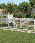 Outdoor Wooden Chicken Coop For Four To Six Chickens With An Elevated Two Tier Hen House Three Compartment Nesting Box Slide Out Tray And Reinforced L Shaped Frame For A Killer Backyard Poultry Setup visible in a garden setting