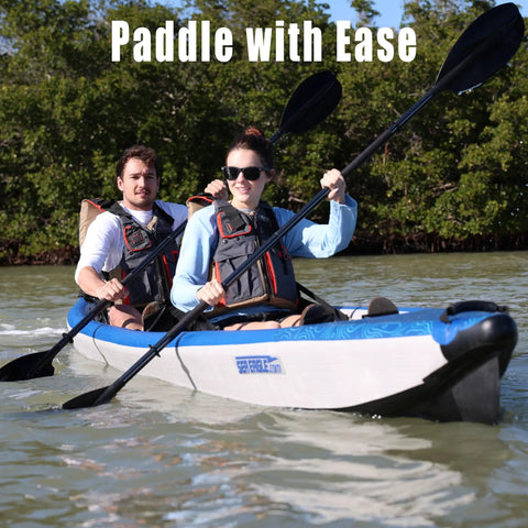 Two people paddling the Razorlite 473rl Inflatable Drop Stitch Kayak Pro Package With Ultra Portable Rigidity Paddles Up To 5 MPH