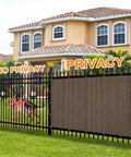 90 Percent Sun Shade Cloth For Patio And Backyard 10x10 Ft Pergola Shade Cover With Grommets shown on backyard fence for privacy.