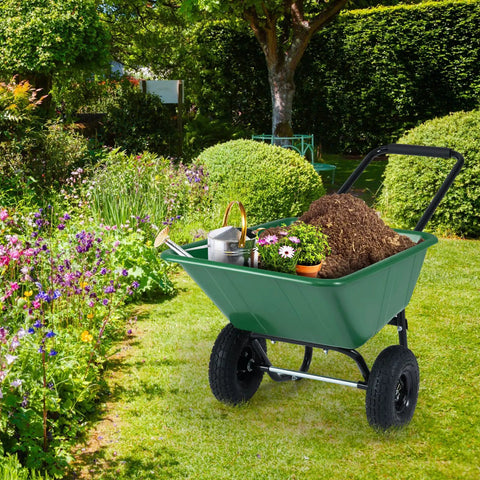 Two Wheel Wheelbarrow Garden Cart With 330 Lbs Capacity And 21 Gallon Volume Heavy Duty Yard Dump Cart in a garden with tools