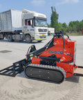 Small But Mighty Mini Skid Steer Loader With Leveler, 1800lbs Capacity, parked on concrete, ideal for gardens and roads.