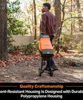 Person using FD1503 Electric Wood Chipper Shredder 15 Amp Motor With 1.8 Inch Cutting Diameter And 14 To 1 Reduction outdoors