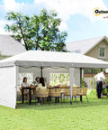 10x20 Pop Up Canopy Tent With Four Sidewalls, Portable Outdoor Party Gazebo Shelter, Instant Setup No Tools Needed, Carry Bag Included, White Patio Backyard Shelter For Parties, Weddings, BBQs, shown set up in a backyard with people dining.