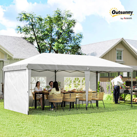 10x20 Pop Up Canopy Tent With Four Sidewalls, Portable Outdoor Party Gazebo Shelter, Instant Setup No Tools Needed, Carry Bag Included, White Patio Backyard Shelter For Parties, Weddings, BBQs, shown set up in a backyard with people dining.